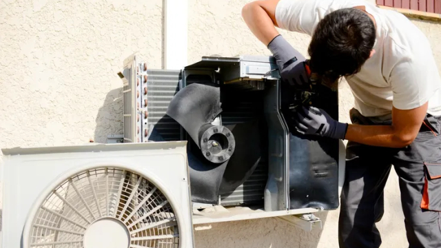 Appliance Medics technician repairing commercial kitchen equipment